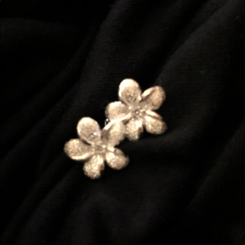 Brand new sterling plumeria earrings